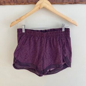 Athleta Mesh Racer Run Mid Rise 4" Shorts in plum purple XS